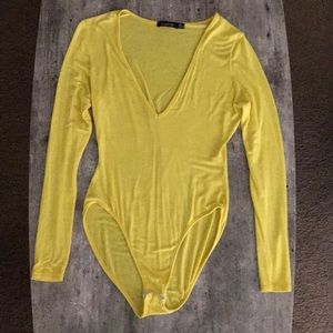 Yellow bodysuit